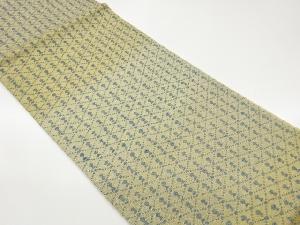 金通し襷に抽象模様織出し袋帯